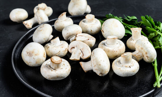 Why is it important to integrate picking lorries with shelving systems in mushroom farms